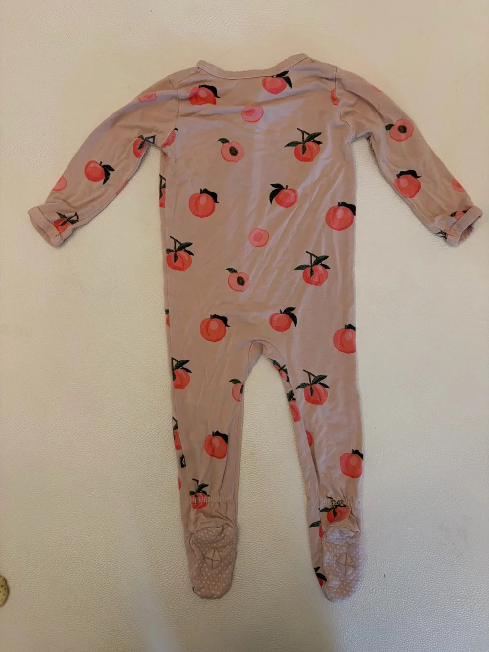 Kyte Baby Footie Zipper Pajamas TRIO. Purple, Peach Print, Yellow. 6-12mo